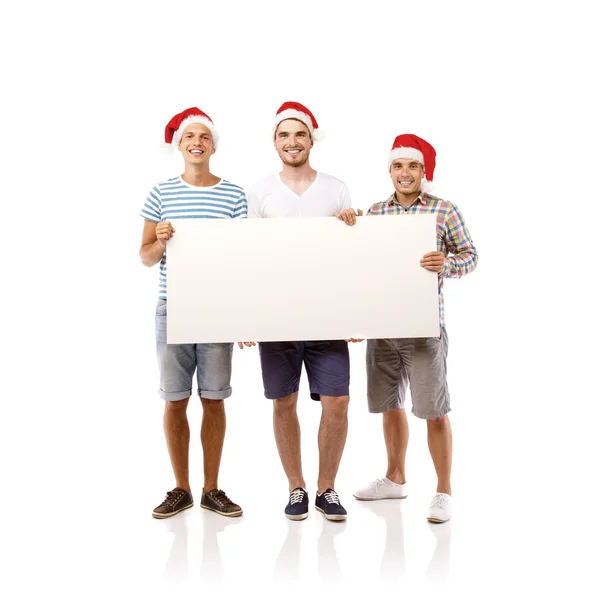 Hombres en sombreros de santa con espacio de copia — Foto de Stock