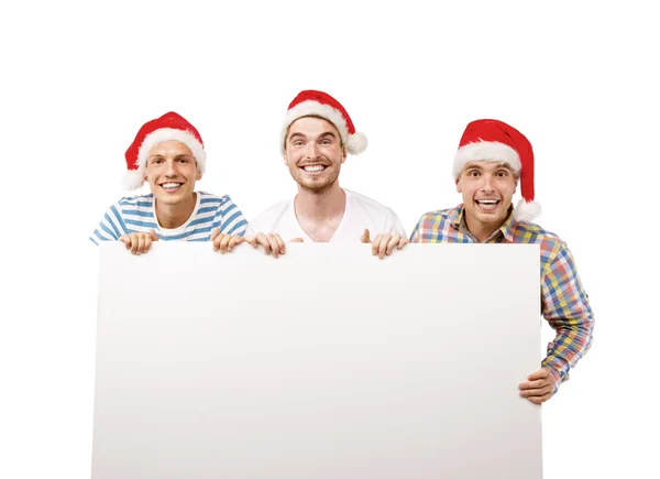 Hombres en sombreros de santa con espacio de copia — Foto de Stock