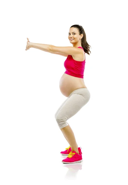 Egzersiz yapan hamile kadın — Stok fotoğraf