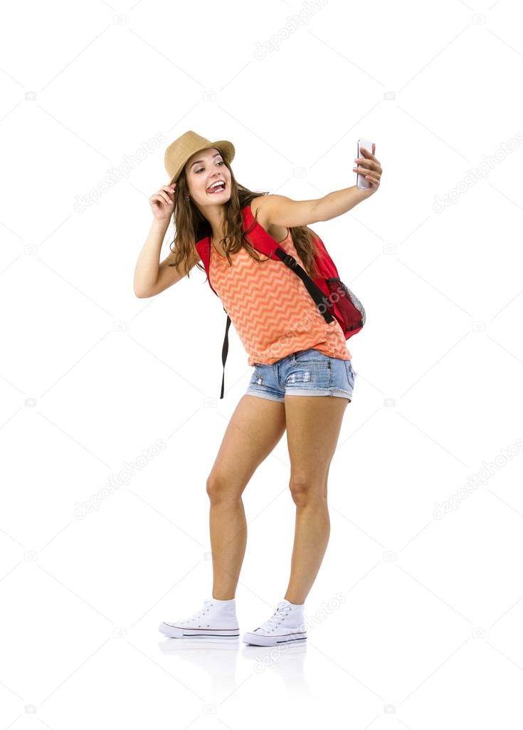 Tourist taking selfie on mobile phone