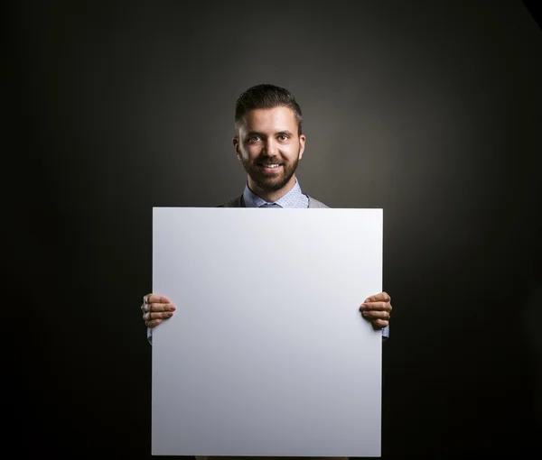 Affärsman Håller Blank Placard — Stockfoto