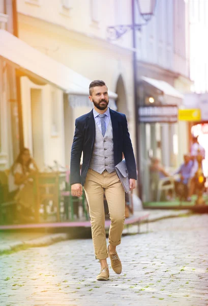 Businessman with briefcase on the street — Stock Photo, Image