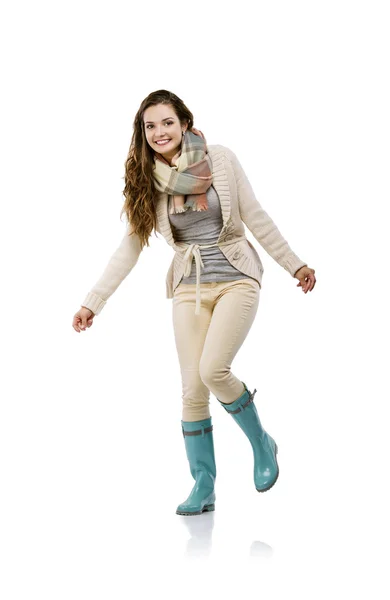 Girl in warm clothes and wellingtons — Stock Photo, Image