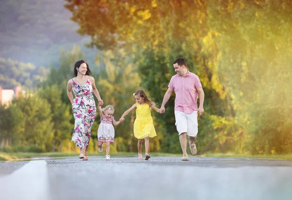 Family having fun on the road — Stock Photo, Image