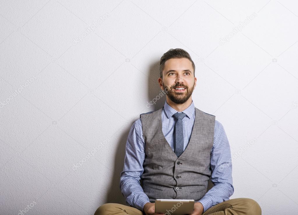 Businessman with digital tablet