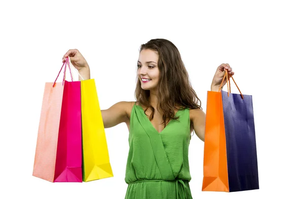 Femme posant avec des sacs à provisions — Photo