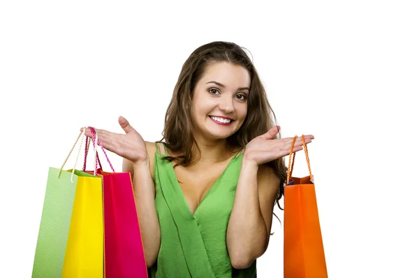 Femme posant avec des sacs à provisions — Photo