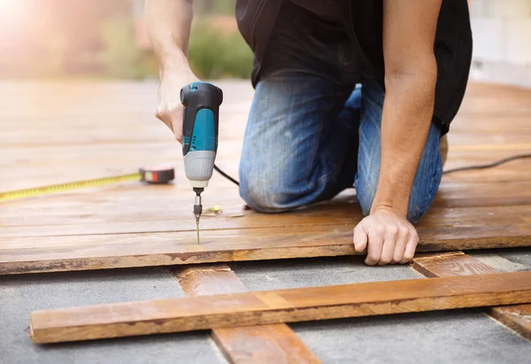 Handyman working with drilling machine — Stock Image Handyman working with drilling machine Royalty Free Stock Photos