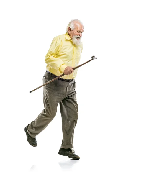 Eski bastonunu kullanmadan yürüyen adam — Stok fotoğraf