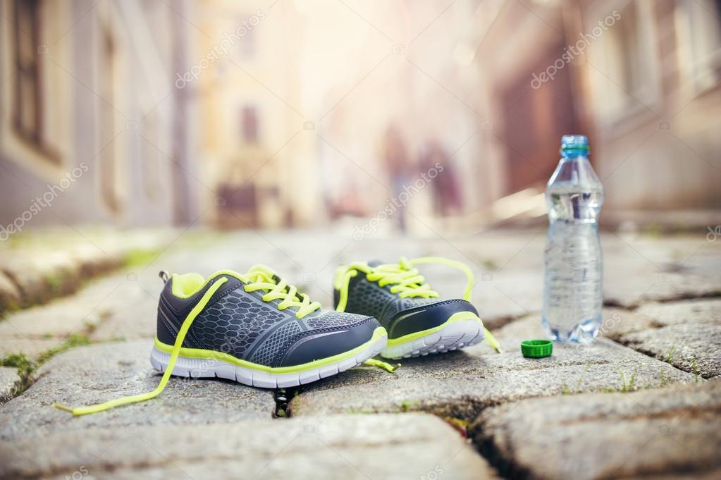 Running shoes and bottle of water Stock Photo by ©halfpoint 56758841