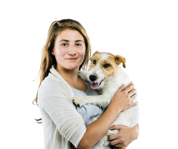 Mulher segurando seu cão bonito — Fotografia de Stock