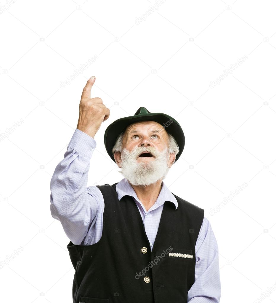 Old man in pointing upwards