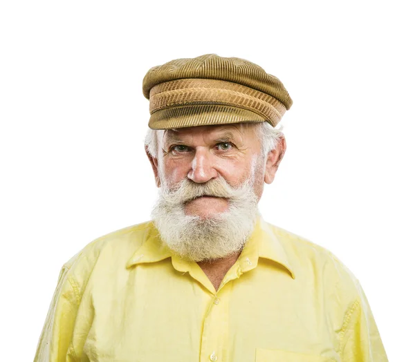 Velho homem barbudo em boné tradicional — Fotografia de Stock