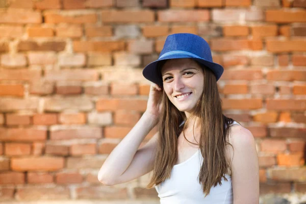 Happy woman in blue hat — Stock Photo, Image