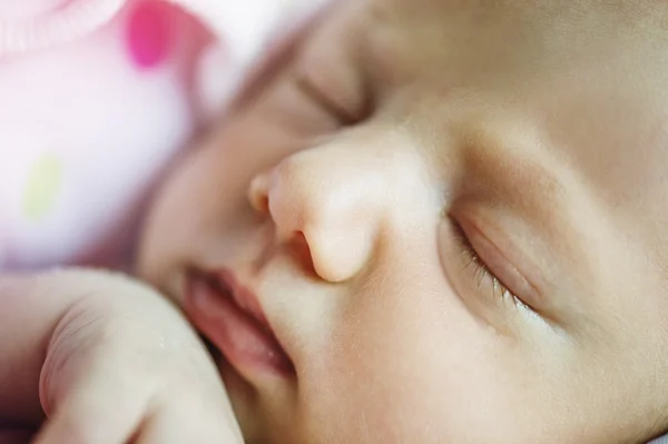 Sleeping baby on the bed — Stock Photo, Image