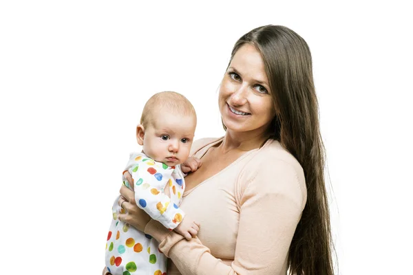 Sorridente madre che tiene in braccio un bambino — Foto Stock