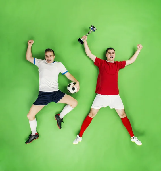 Jugadores de fútbol celebrando la victoria . — Foto de Stock