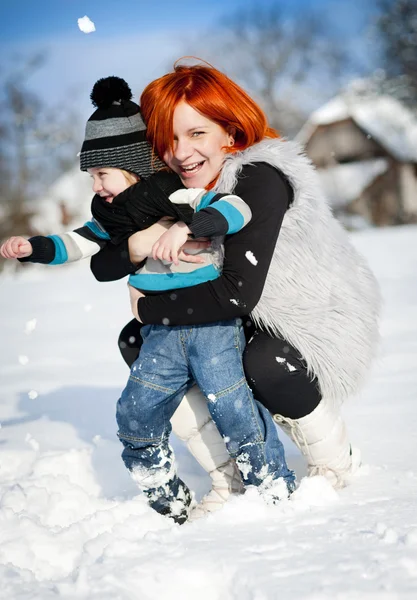 Mother hugging her son — Stock Photo, Image