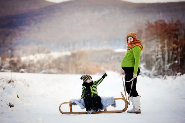 Mum with her son in winter — Stock Photo, Image