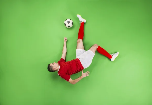 Jugador de fútbol en acción — Foto de Stock