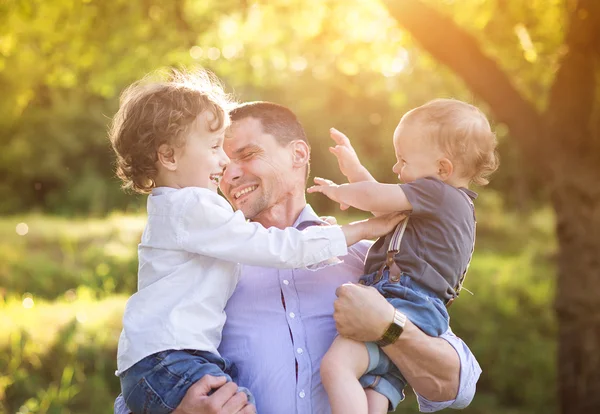 Boys and dad enjoying their time together — Stock Photo, Image