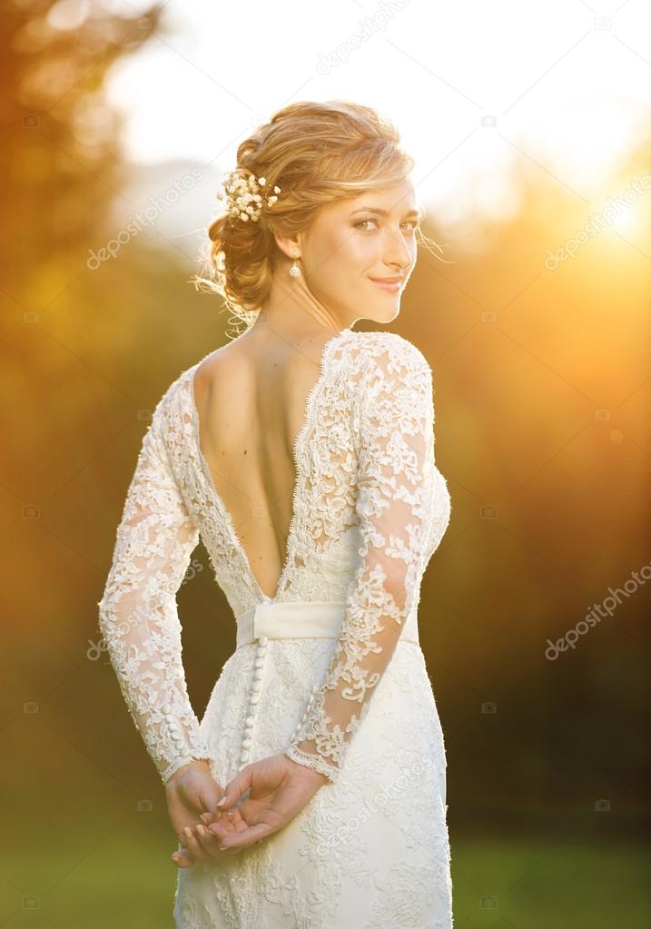 Beautiful bride at the sunset