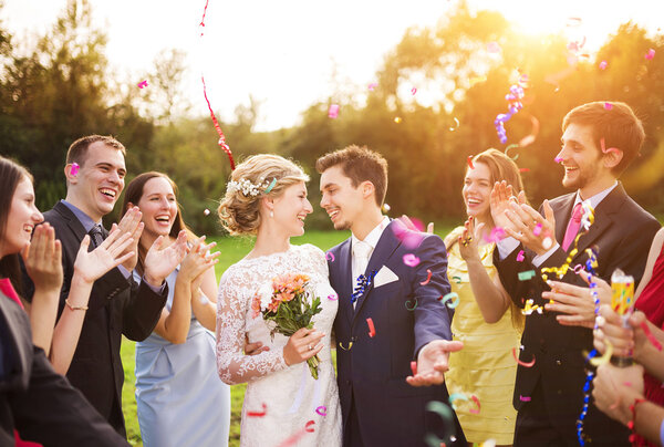 Newlywed couple and their friends