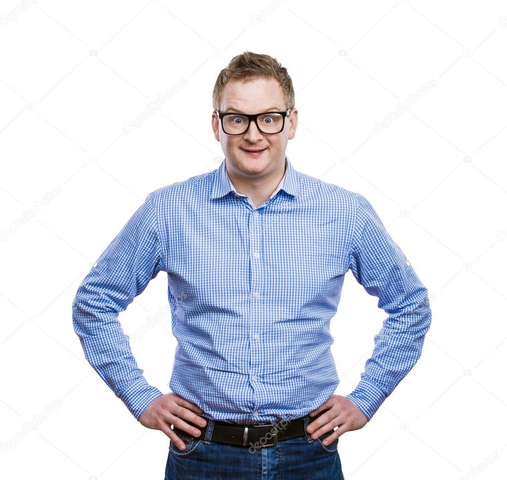 Man standing with hands on hips