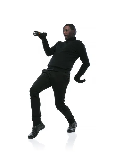 Thief with balaclava on face, dressed in black — Stock Photo, Image