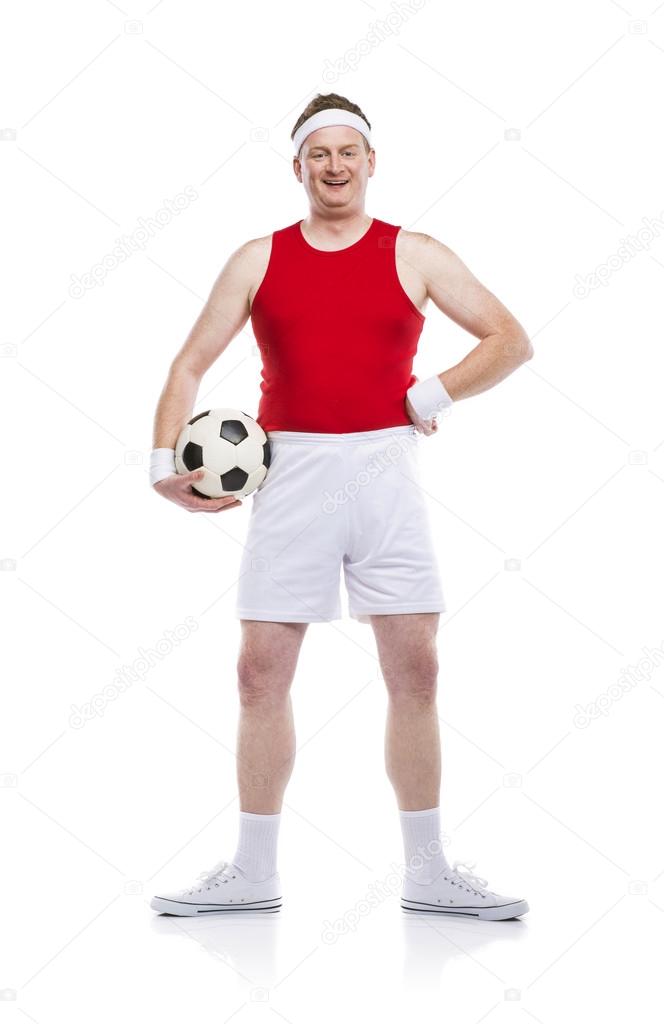 Funny football player with a ball