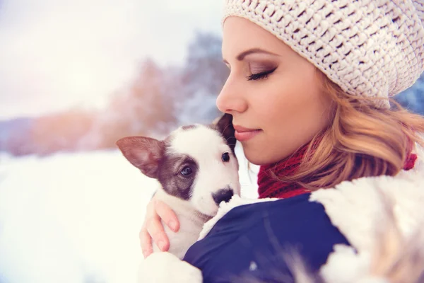 Woman having fun with her dog puppy — Stock Photo, Image