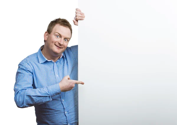 Man holding a blank sign board — Stock Photo, Image