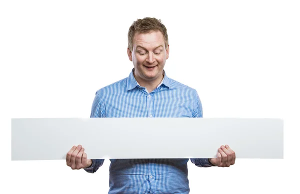 Man holding a blank sign board — Stock Photo, Image