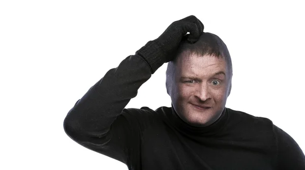 Thief in balaclava scratching head by hand — Stock Photo, Image