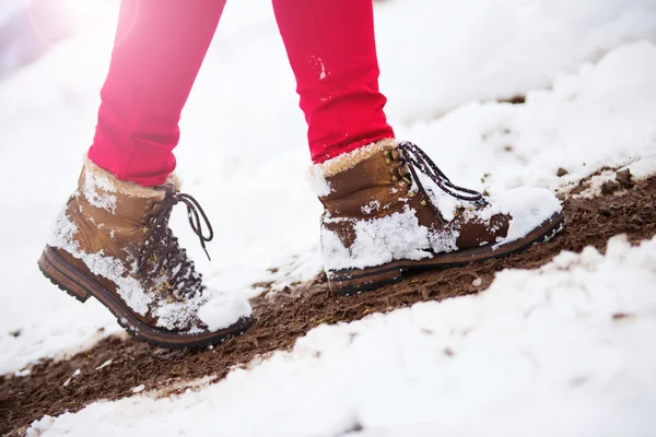 Woman in red trousers and leather boots — Stock Photo, Image