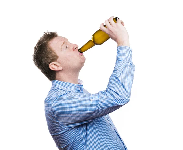 Drunk man drink a beer bottle — Stock Photo, Image