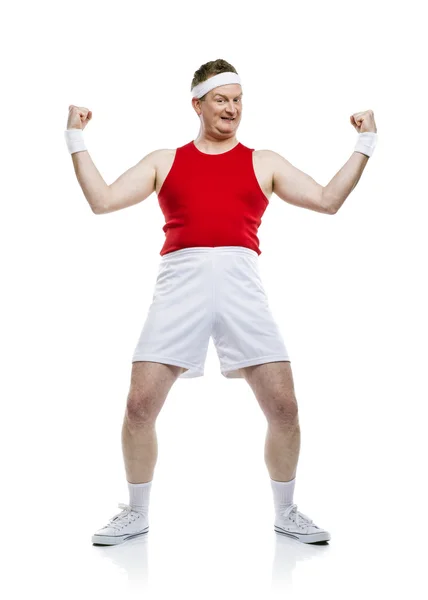 Sportsman shows his biceps . — Stock Photo, Image