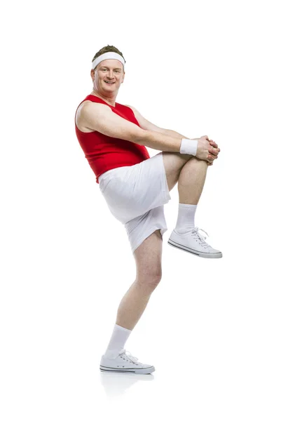 Esportista fraco engraçado exercitando — Fotografia de Stock