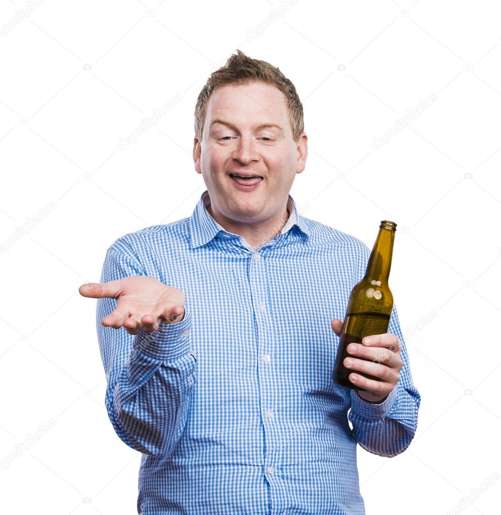 Drunk man holding a beer bottle