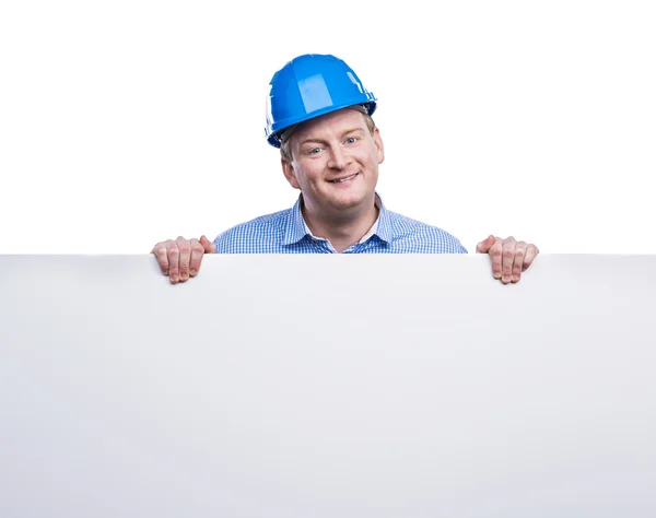 Engineer holding a blank board — Stock Photo, Image