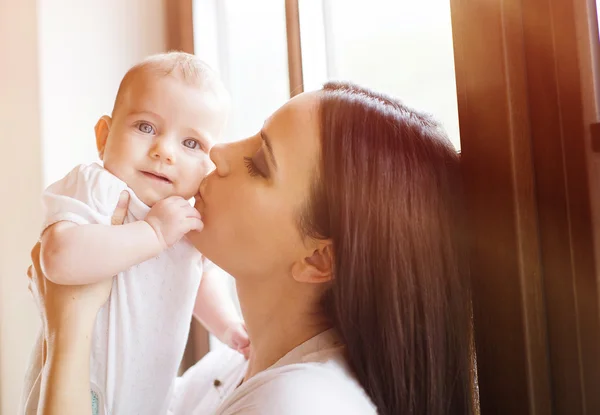 Little baby in arms of her mother — Stock Photo, Image