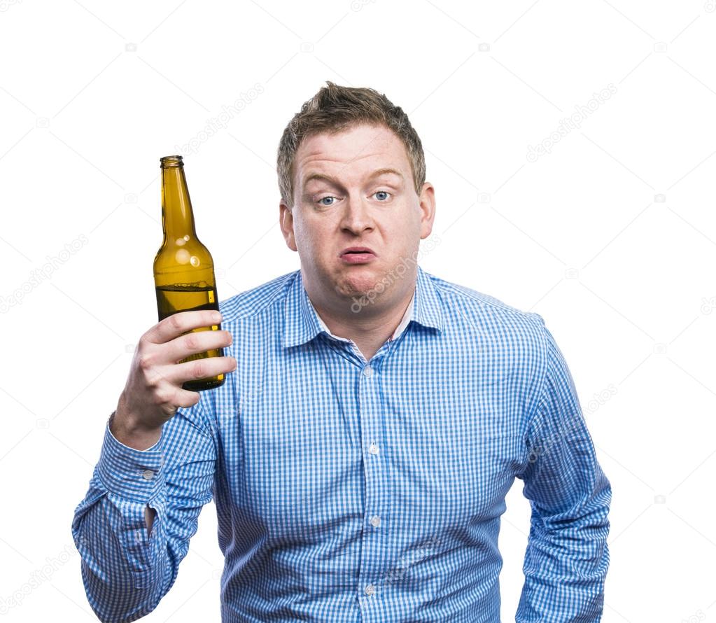 Drunk man holding a beer bottle