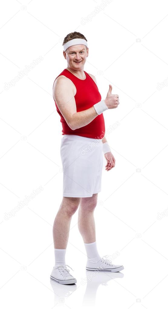 Funny sportsman gesturing thumb up sign
