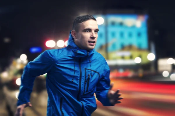 Sportsman Jogging at night — Stock Photo, Image