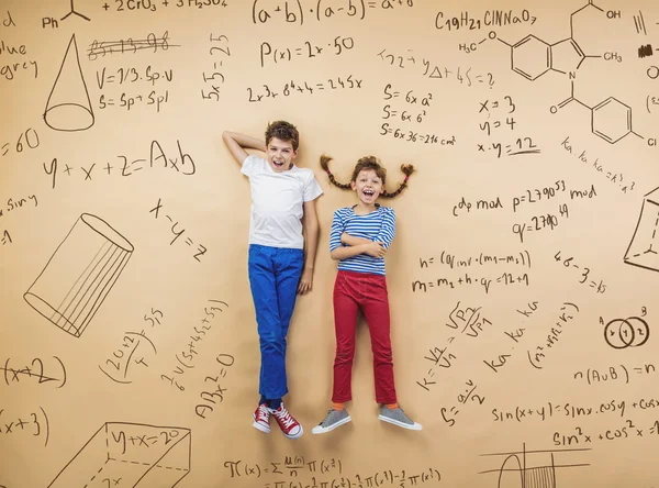 Two schoolkids learning — Stock Photo, Image