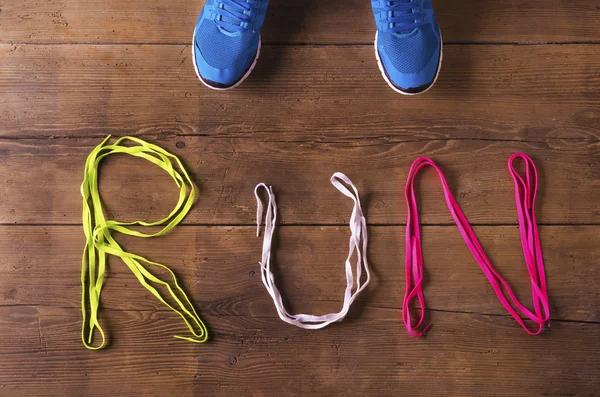 Running shoes on the floor — Stock Photo, Image