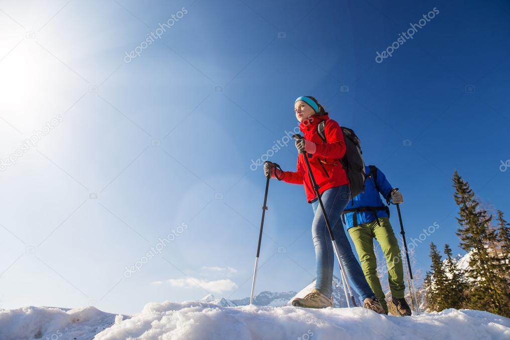 Couple hiking in winter