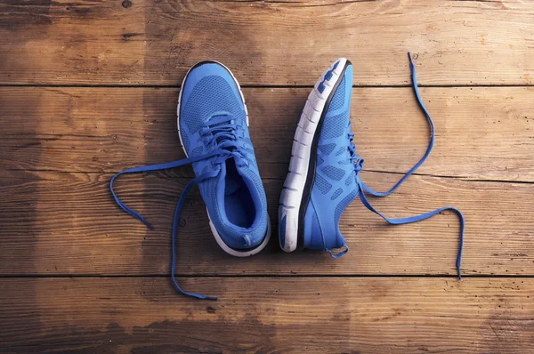 Running shoes on the floor — Stock Photo, Image