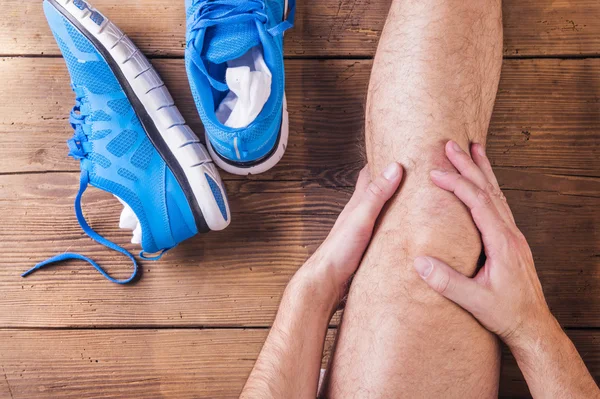 Injured runner — Stock Image Injured runner Stock Photo