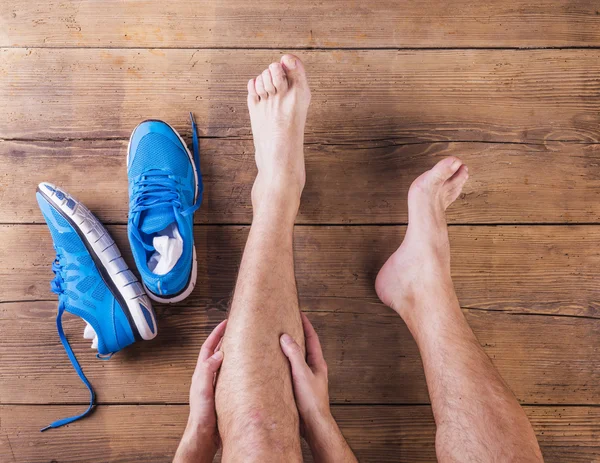 Injured runner — Stock Image Injured runner Royalty Free Stock Images